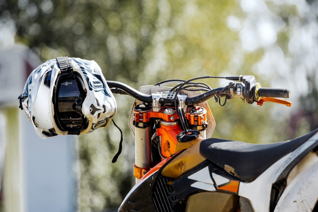 Sports helmet hanging on handlebars